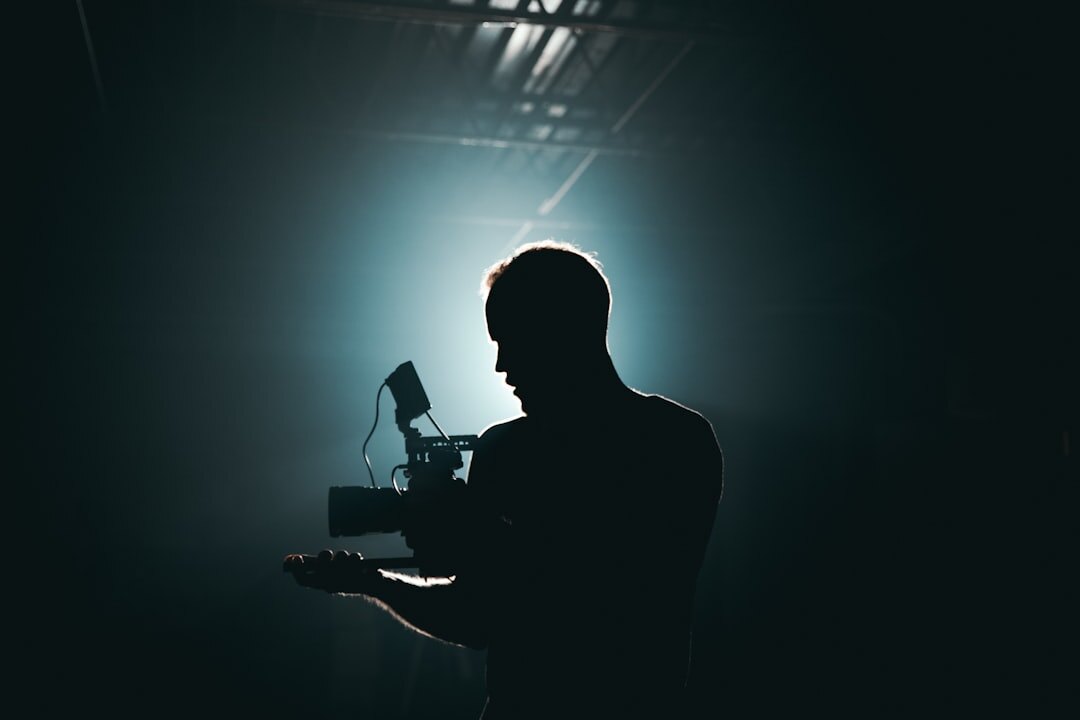 cinematographer adjusting lights